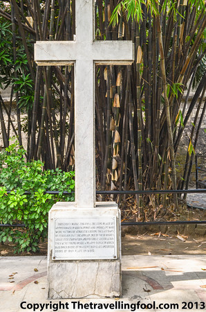 Cross marking the resting place of 600 Filipino and American prisoners