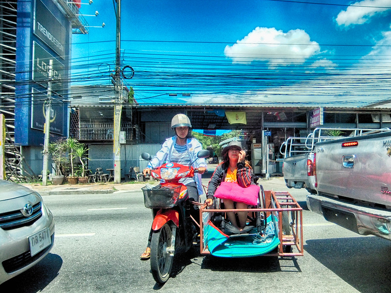 Thai woman on motorcycle